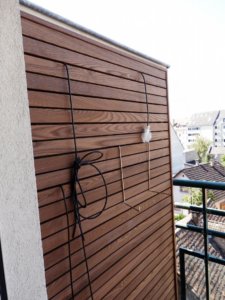 Bardage bois sur mur de balcon ou terrasse